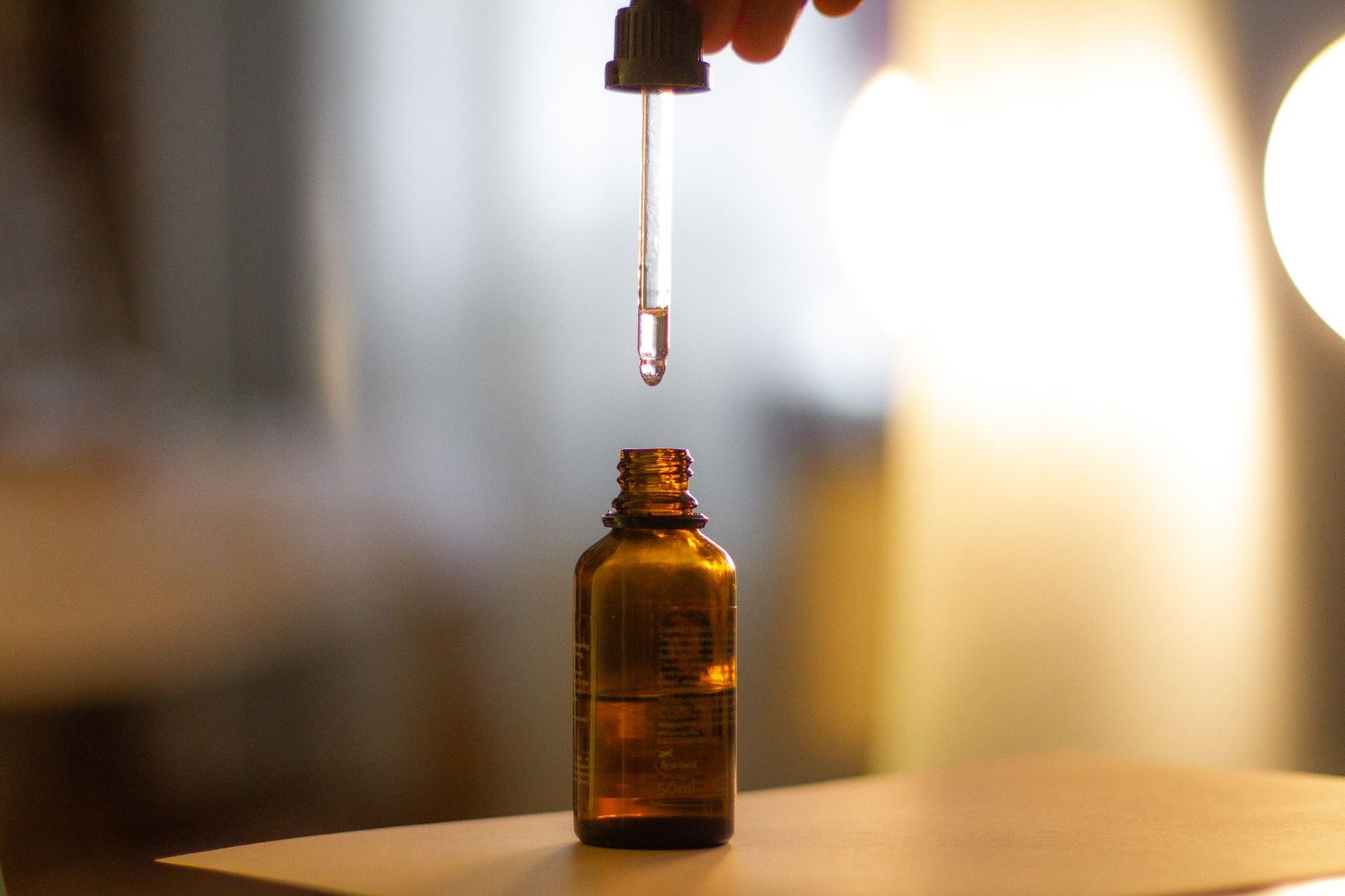 Three or four drops is the whole face, not per cheek